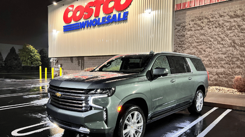 A 2024 Chevy Suburban posed in front of a Costco