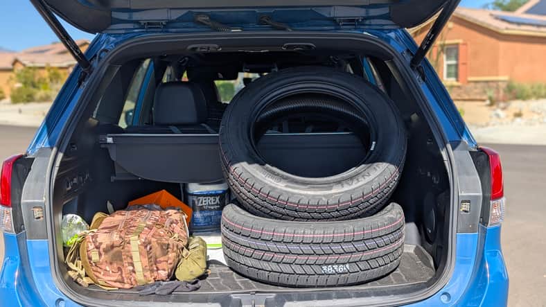 My sister's new TerrainContact H/T tires in the trunk of her 2023 Subaru Forester Wilderness