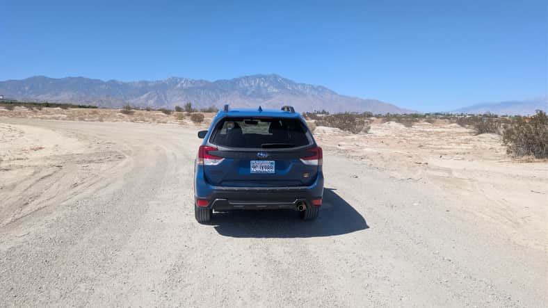 The rear end of my sister's 2023 Subaru Forester Wilderness on a dirt road