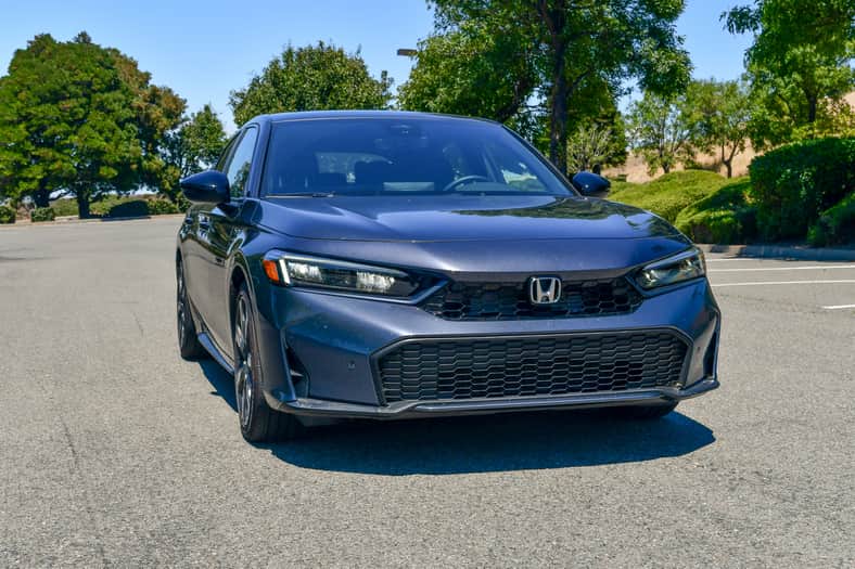 The front end of the 2026 Honda Civic Sport Touring Hybrid