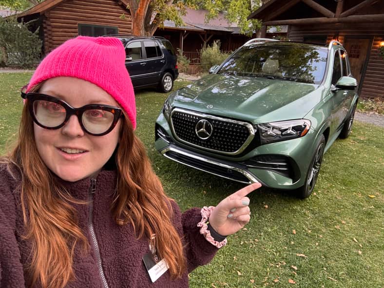 Natalie standing with the 2027 Mercedes-Benz GLE 500e